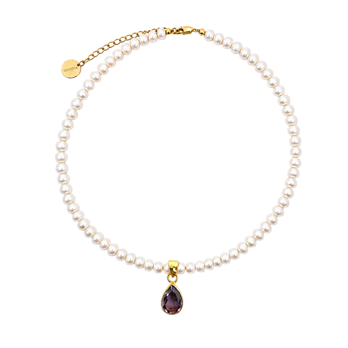 A Sephina freshwater pearl necklace with a gold chain extender and amethyst pendant.